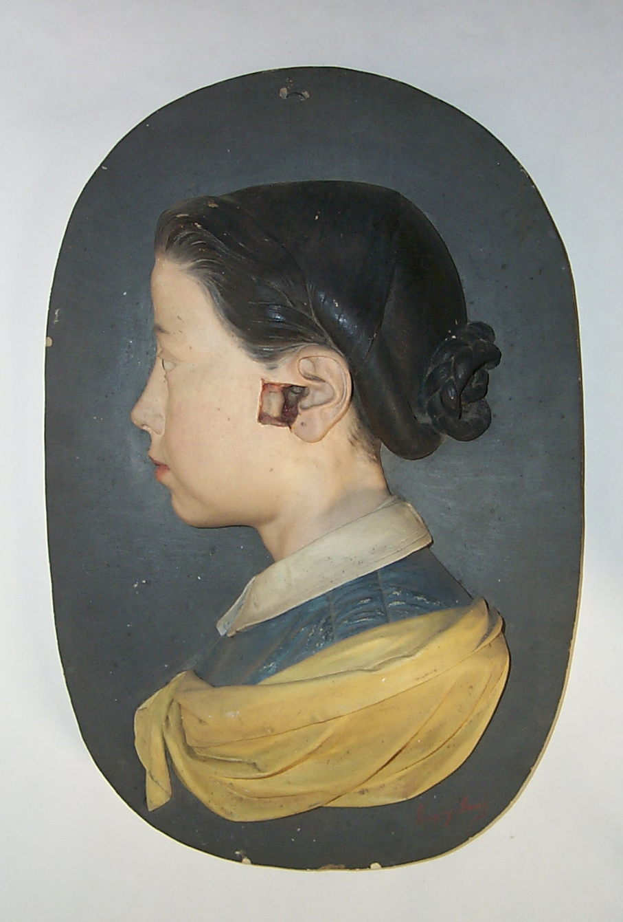 Bust de jove que serveix com a model anatòmic per representar la situació i aspecte extern de l'oïda interna. Barcelona, c. 1860.
